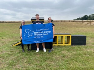 Community volunteering: Group and the NAWT sign